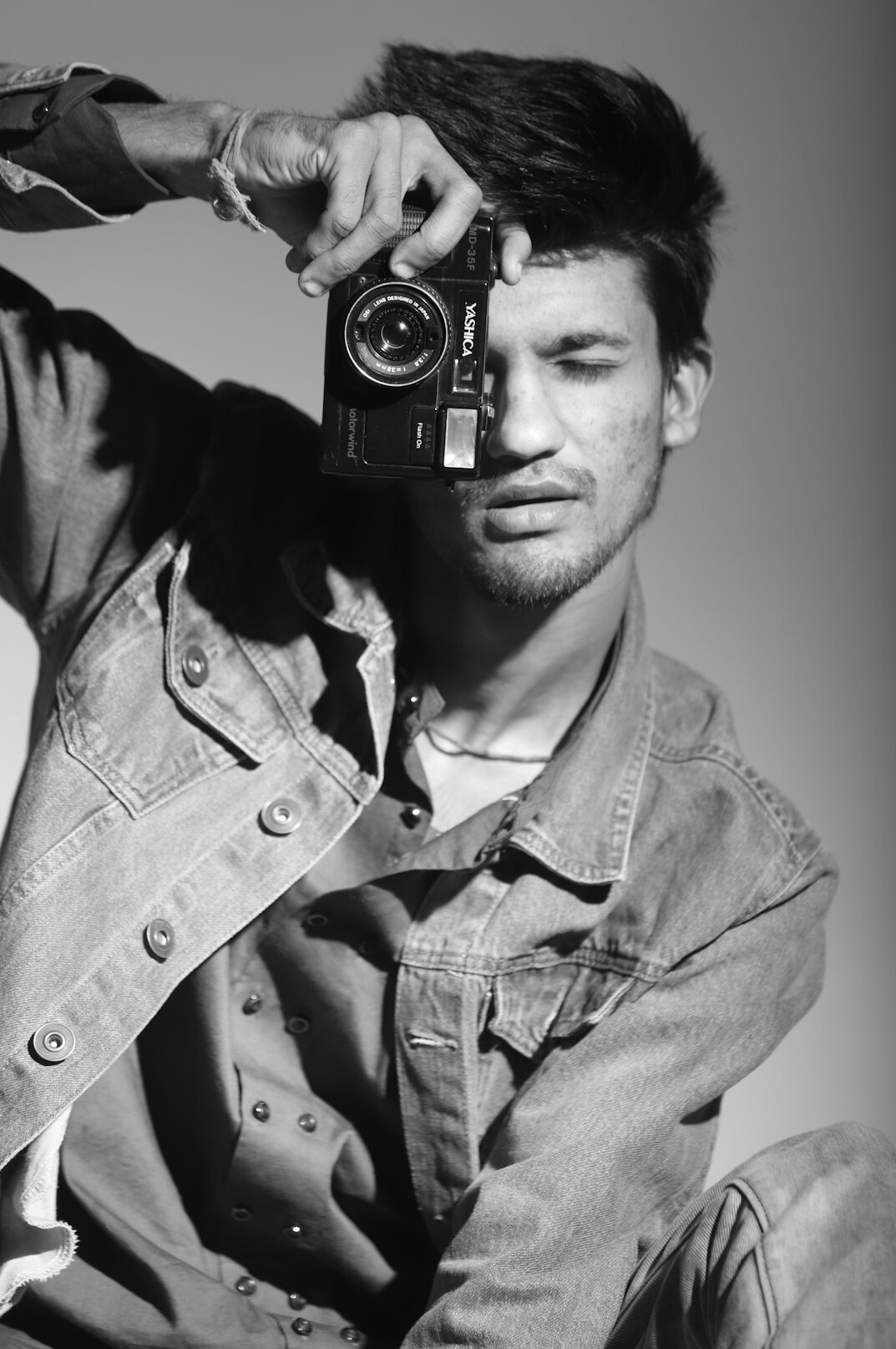 Studio portrait of a middle-aged Chilean male photographer