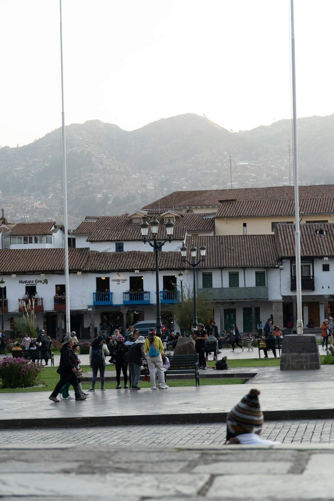 child playing in plaza