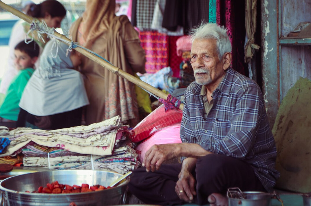 old man selling herbs